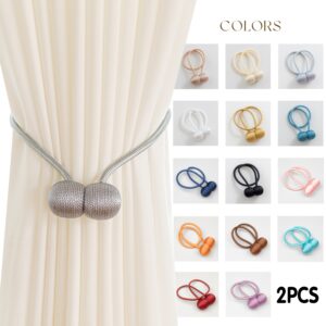 A Set of Two Modern Minimalist Magnetic Curtain Ties Is on, Featuring Thicker Twisted Ropes And Flexible Magnetic Ties. They Are Durable, Easy to Install, And Do Not Require Drilling, Making Them Perfect for Bedroom And Living Room Decor